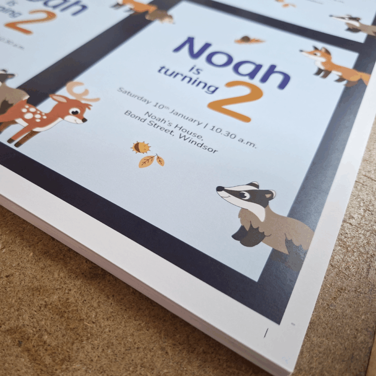 An image of a real world example of bleed being used on a sheet of card